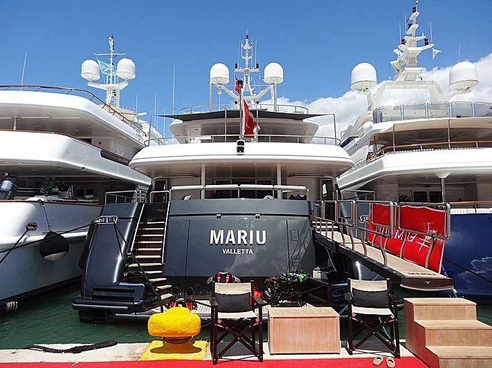 a large ship docked aboard MARIU Yacht for Sale