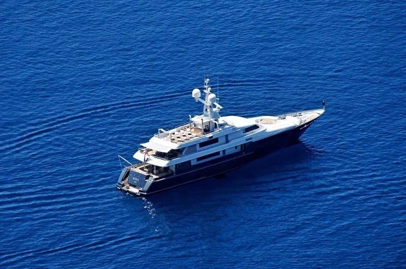 a large ship in the water aboard MARIU Yacht for Sale