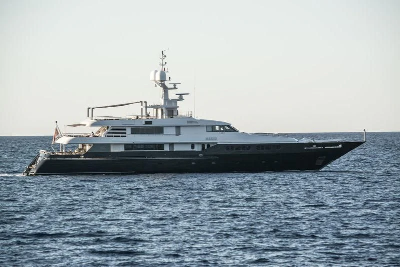a large ship in the water aboard MARIU Yacht for Sale