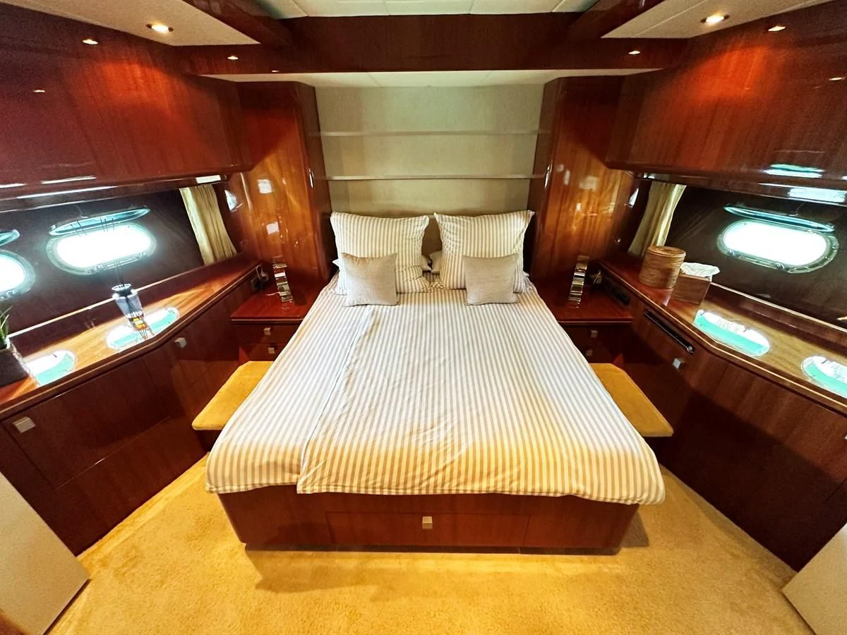 a bed in a room aboard ESPRESSO Yacht for Sale