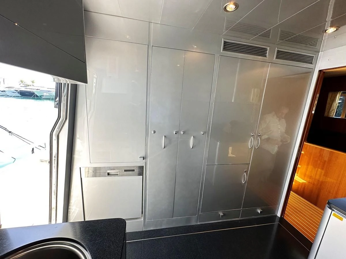 a large glass wall with glass doors aboard ESPRESSO Yacht for Sale