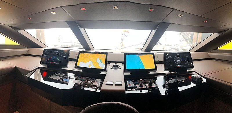 a room with computers and monitors aboard PHANTOM Yacht for Sale