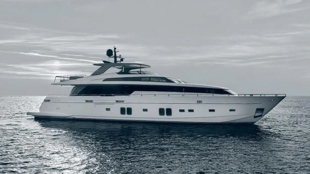 a white yacht in the water aboard PHANTOM Yacht for Sale