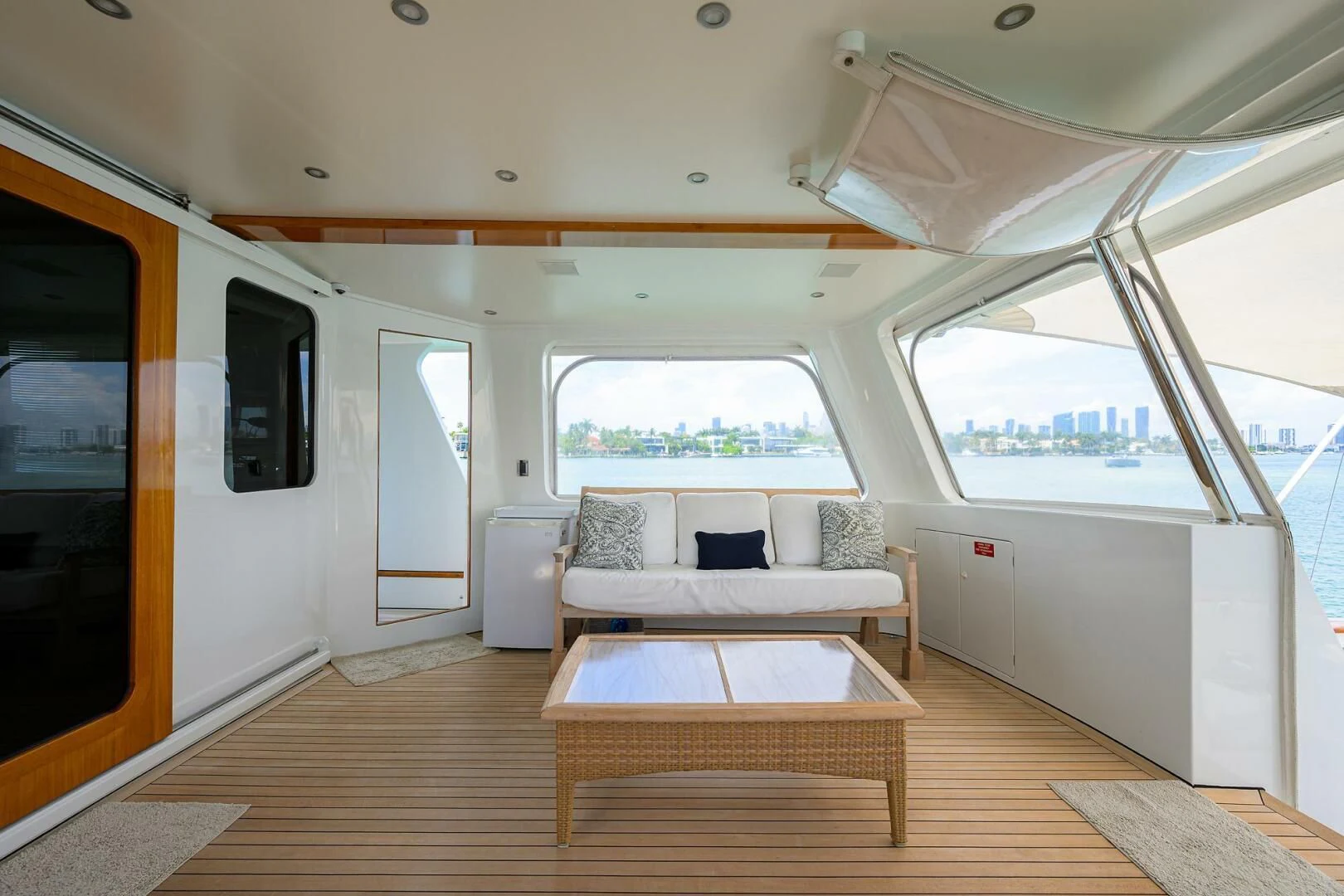 a room with a couch and a table aboard ELECTRA Yacht for Sale