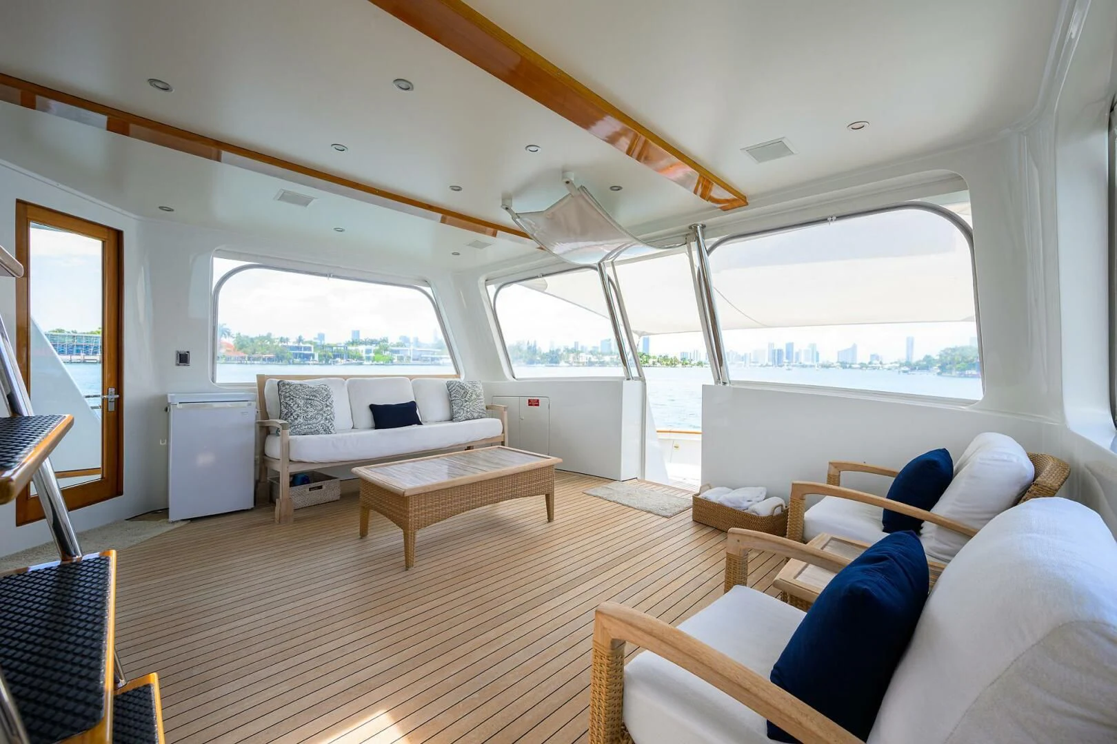 a room with a couch and a table aboard ELECTRA Yacht for Sale