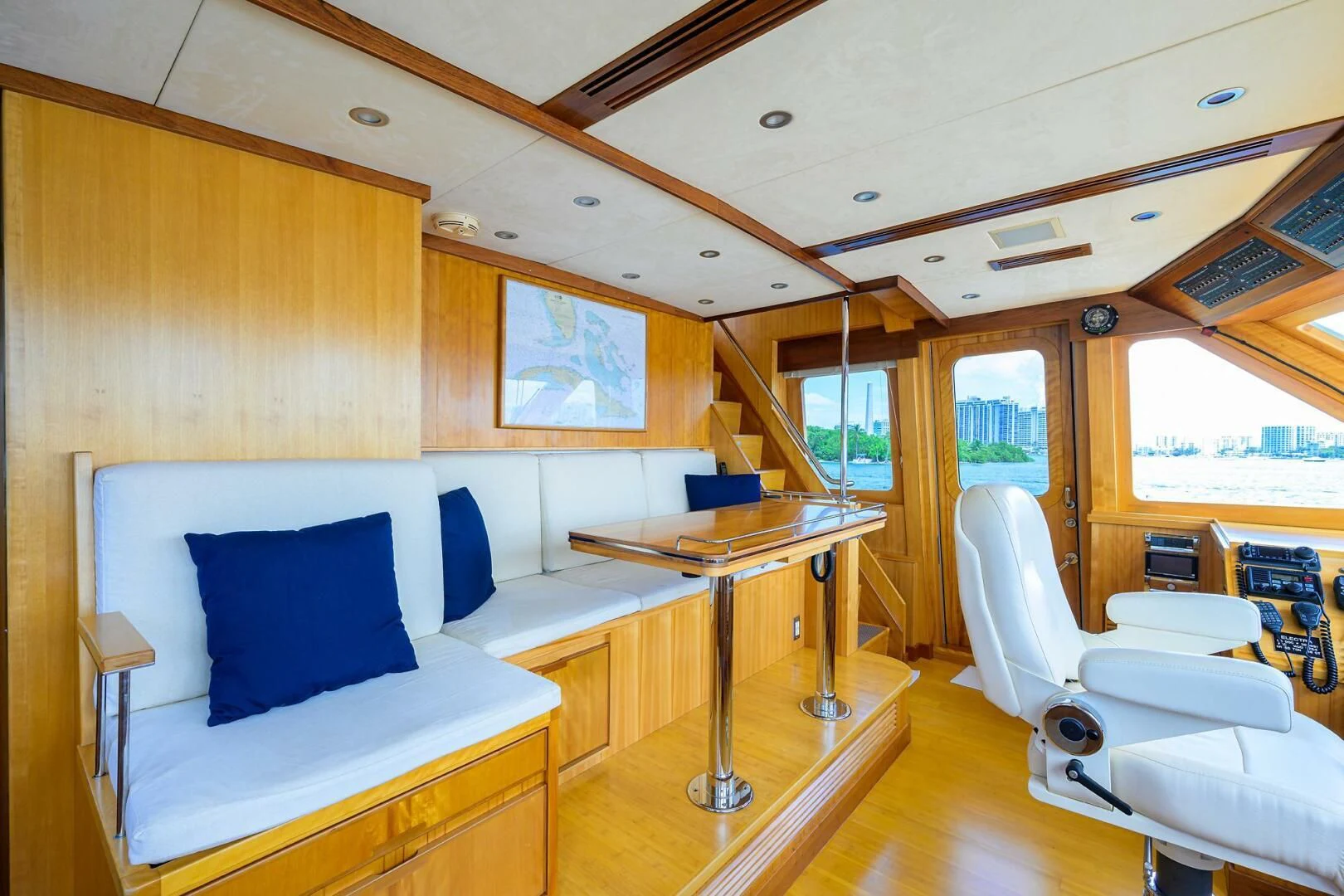 a room with a table and chairs aboard ELECTRA Yacht for Sale