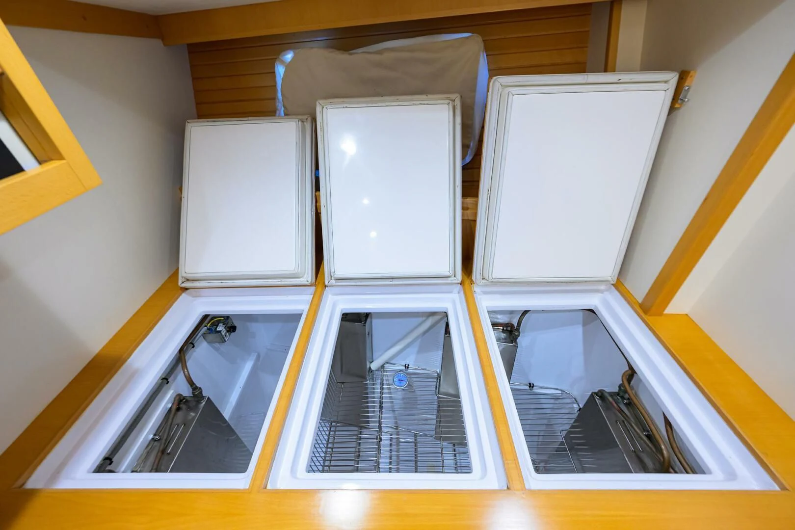 a room with a couple of open drawers aboard ELECTRA Yacht for Sale