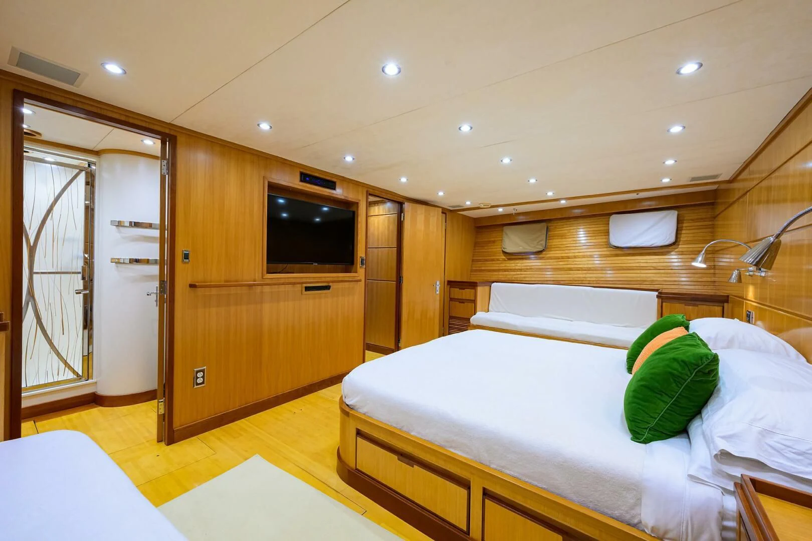 a room with a bed and a tv aboard ELECTRA Yacht for Sale