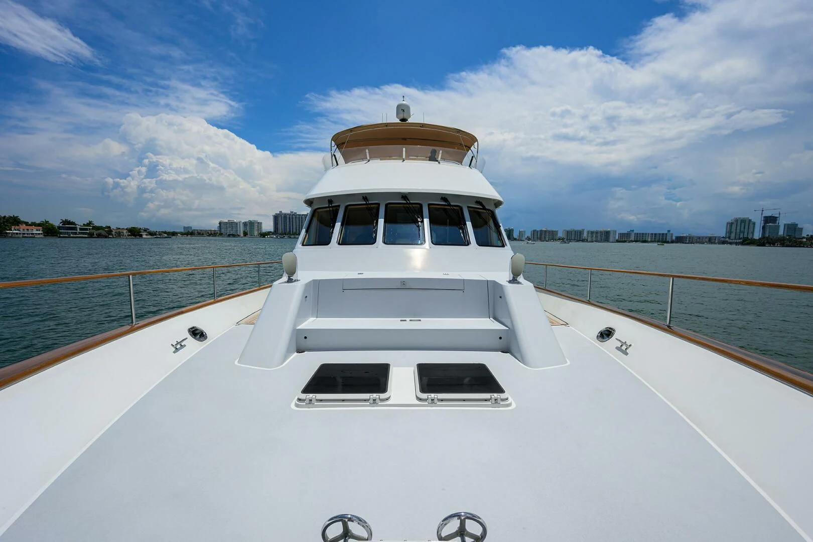 a white boat on a road aboard ELECTRA Yacht for Sale