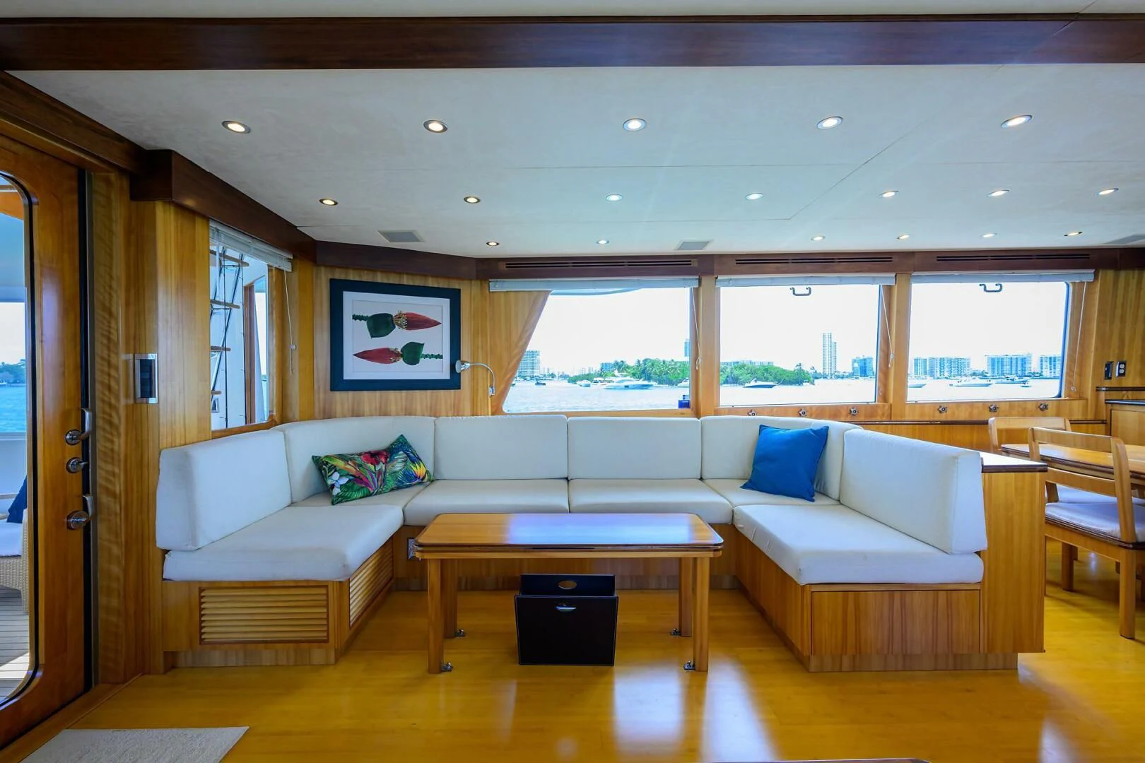 a living room with a couch and a table aboard ELECTRA Yacht for Sale