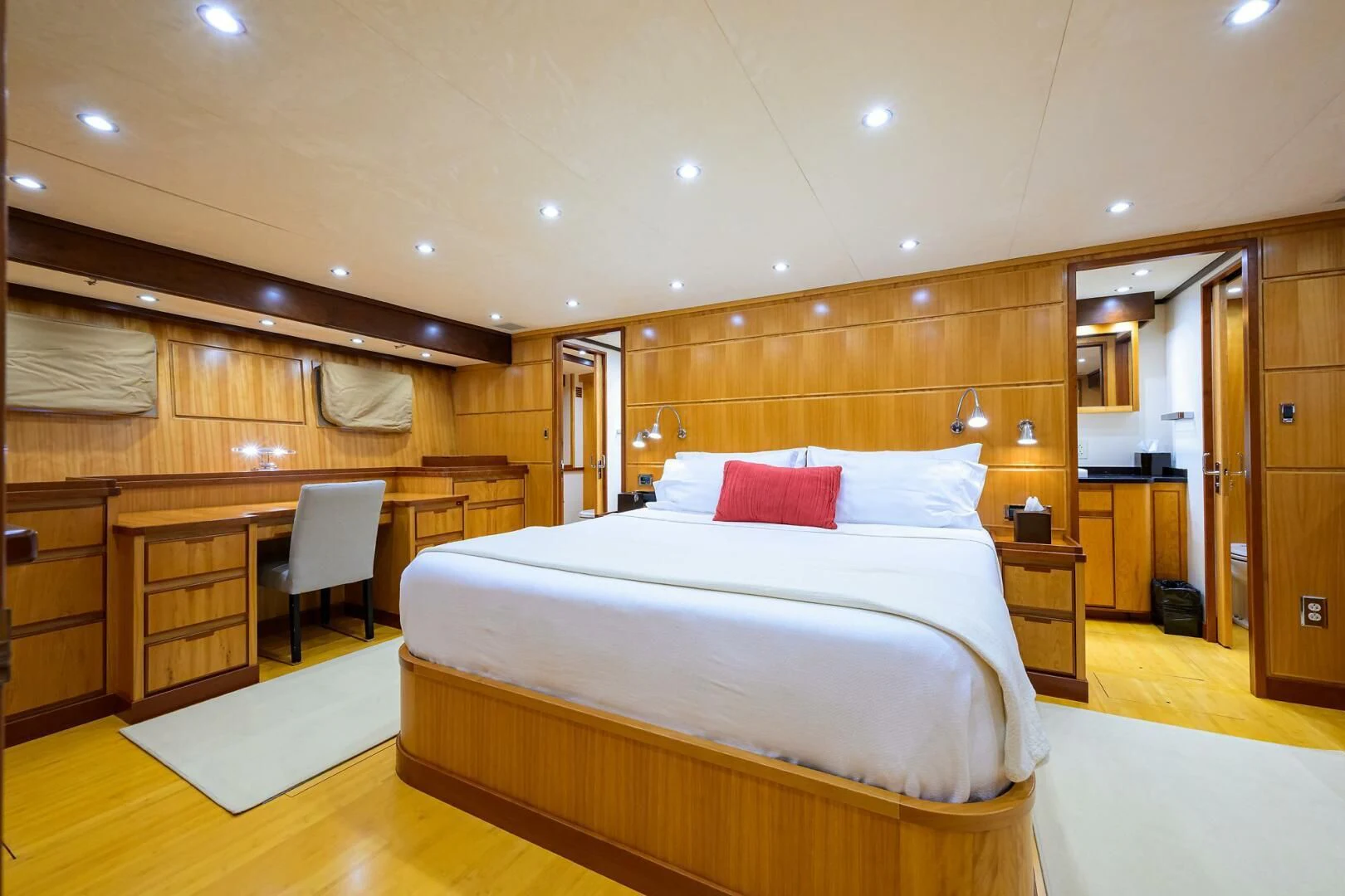 a large bedroom with a large bed aboard ELECTRA Yacht for Sale