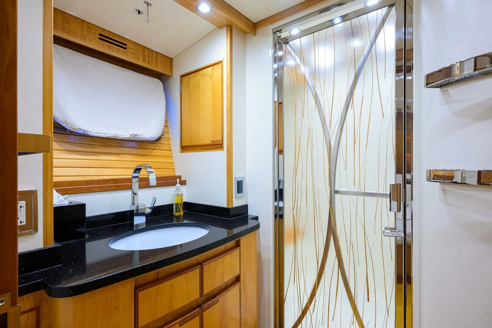 a bathroom with a sink and a shower aboard ELECTRA Yacht for Sale