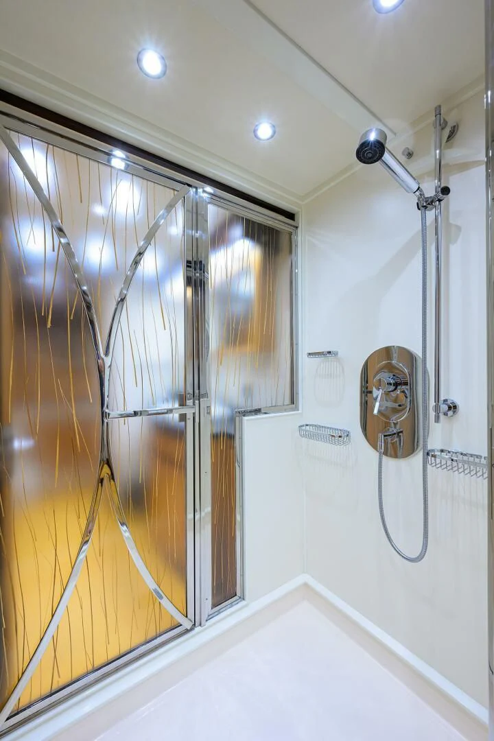a bathroom with a shower unit aboard ELECTRA Yacht for Sale