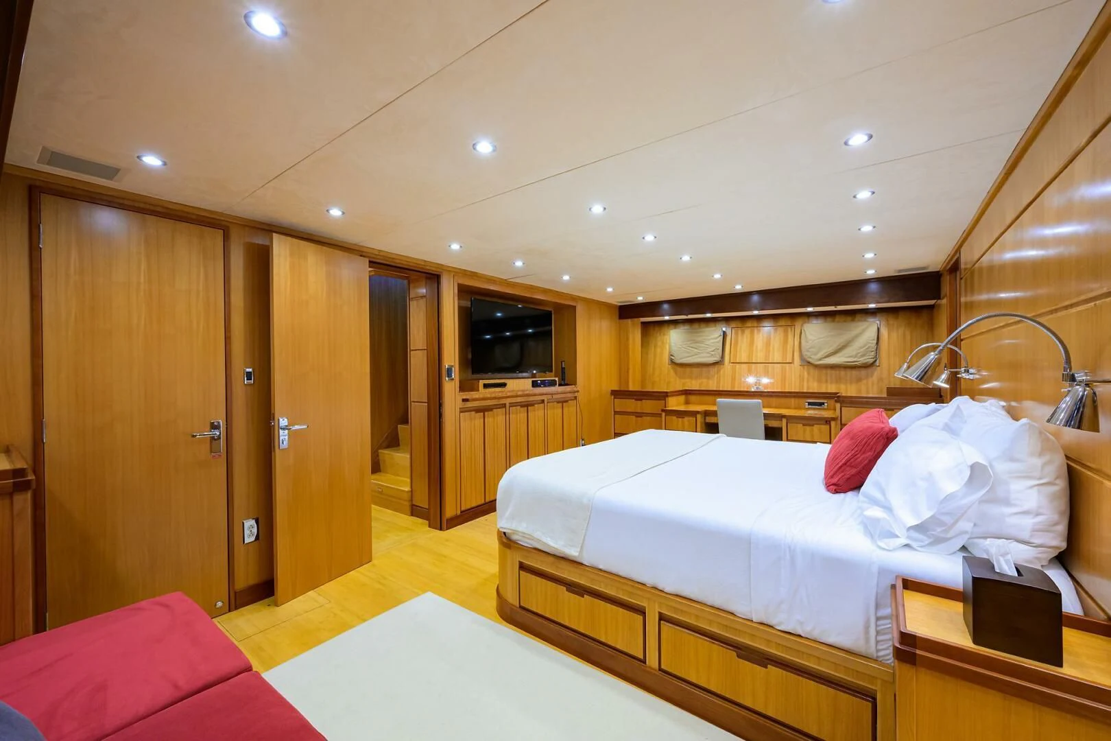 a room with a bed and a desk aboard ELECTRA Yacht for Sale