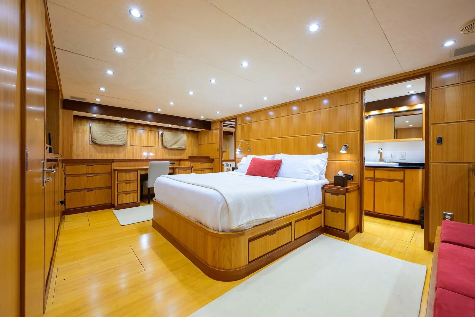 a large bedroom with a large bed aboard ELECTRA Yacht for Sale