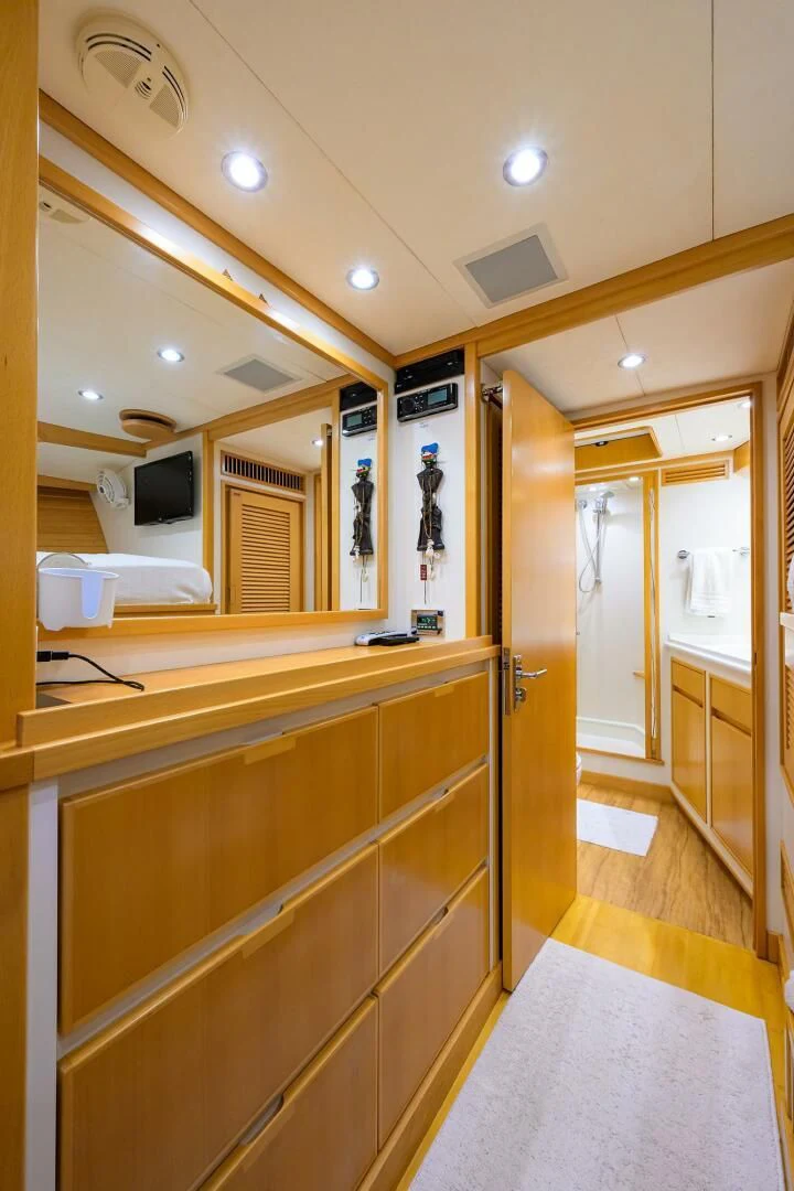 a bathroom with a countertop sink and cabinets aboard ELECTRA Yacht for Sale