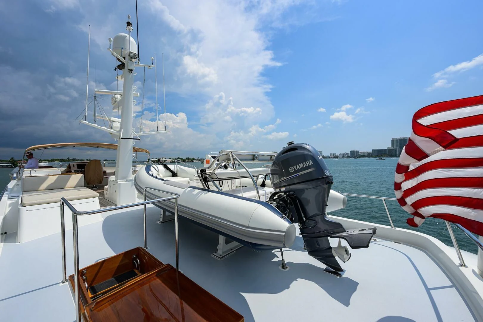 a boat with a person sitting on it aboard ELECTRA Yacht for Sale
