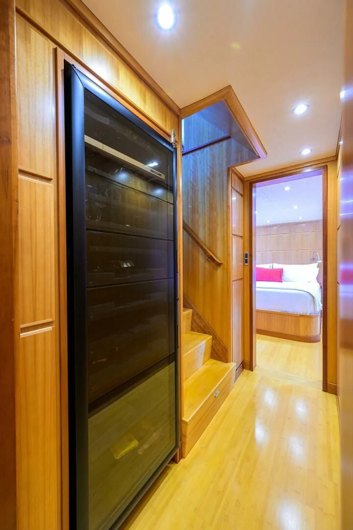 a bedroom with a closet and a bed aboard ELECTRA Yacht for Sale