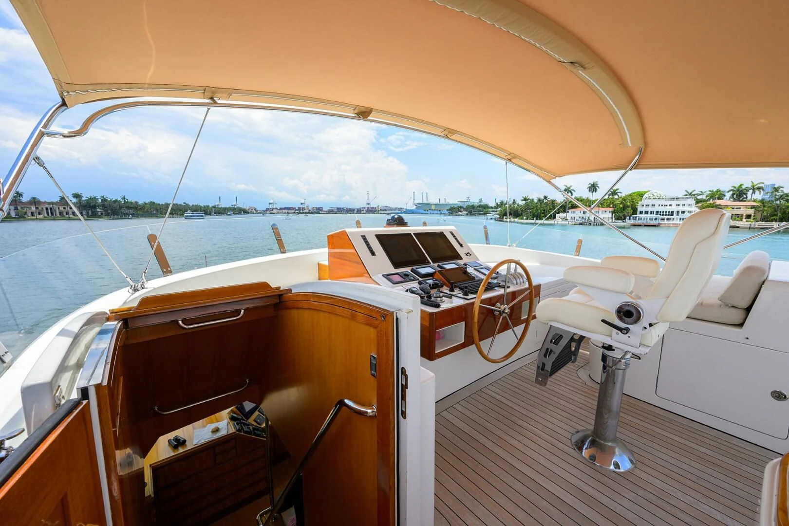 a boat with a deck and a deck with a view of the water aboard ELECTRA Yacht for Sale