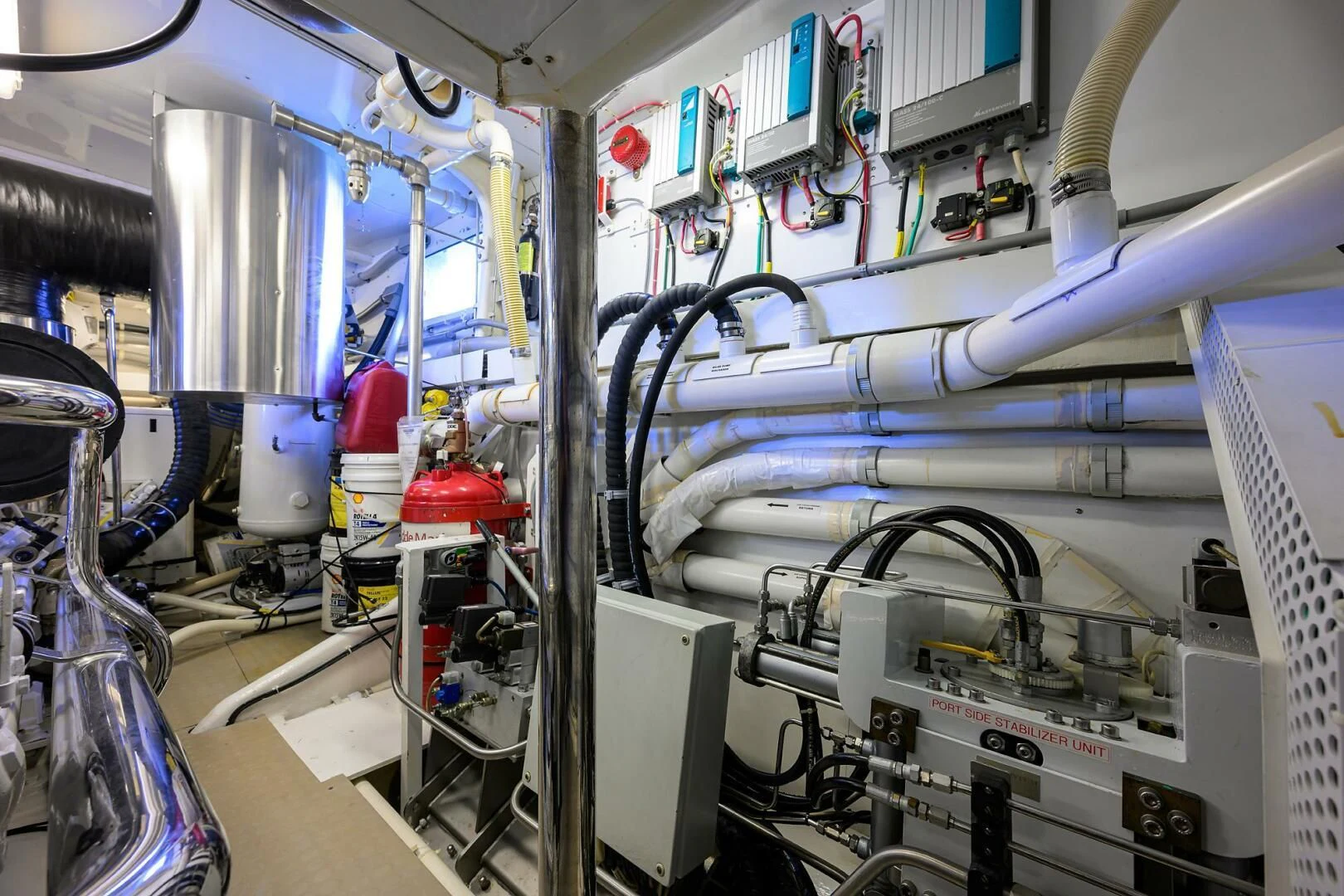 a room with several machines aboard ELECTRA Yacht for Sale