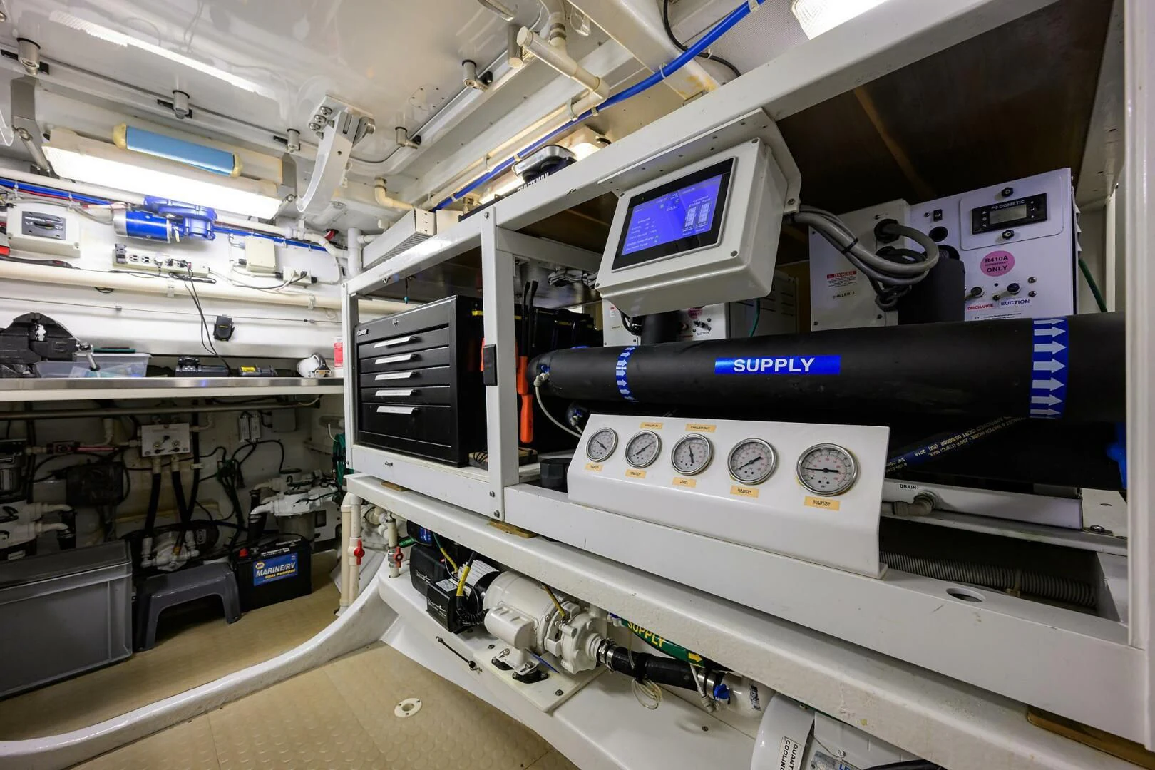 a room with a computer and equipment aboard ELECTRA Yacht for Sale