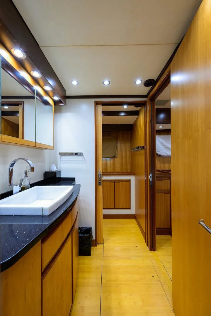 a bathroom with a sink and a mirror aboard ELECTRA Yacht for Sale