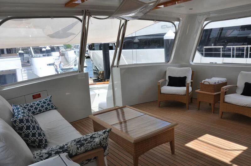 a room with a table and chairs aboard ELECTRA Yacht for Sale