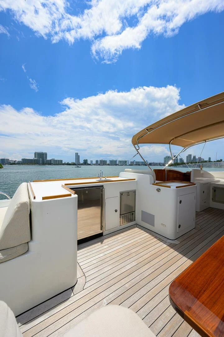 a room with a view of a city and water aboard ELECTRA Yacht for Sale