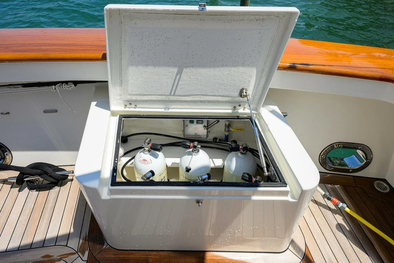 a white and black machine aboard ELECTRA Yacht for Sale
