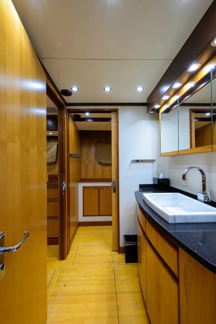 a bathroom with a sink and a mirror aboard ELECTRA Yacht for Sale