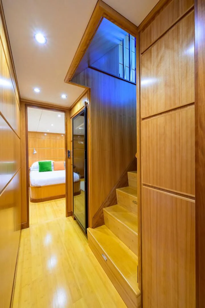 a bathroom with a wood cabinet aboard ELECTRA Yacht for Sale