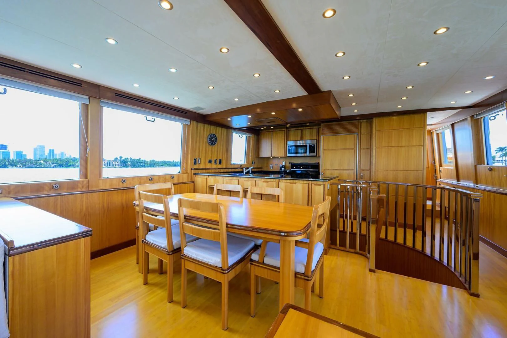 a kitchen with a dining table aboard ELECTRA Yacht for Sale