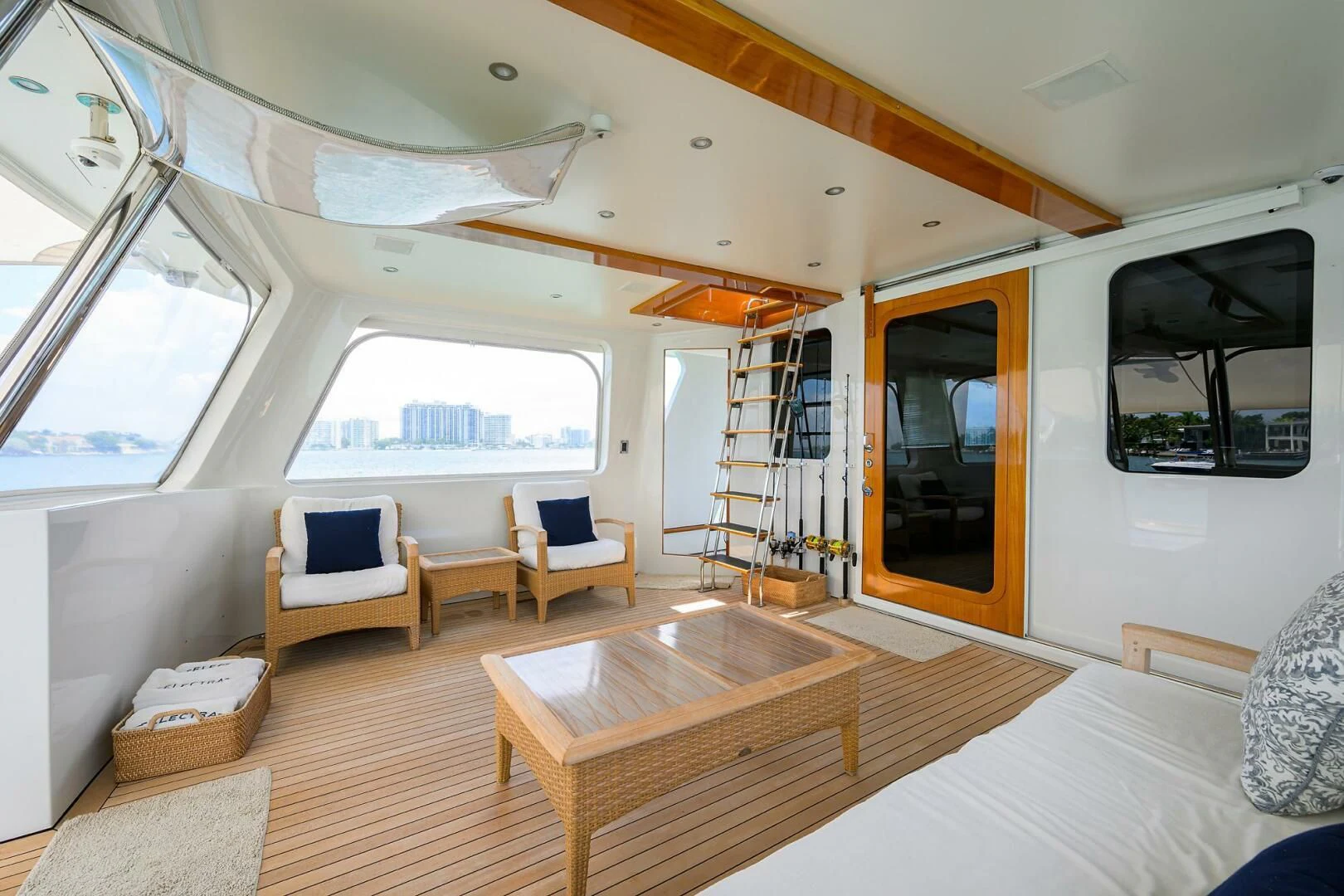 a room with a bed and a table aboard ELECTRA Yacht for Sale