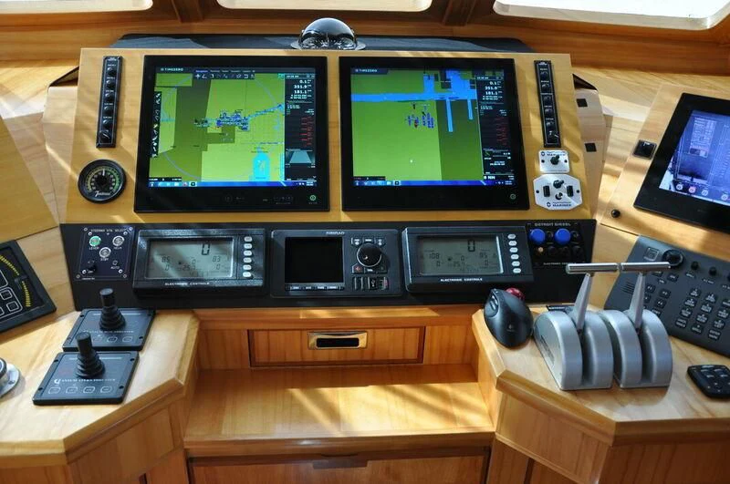 a video game system with a couple of monitors and a game controller aboard ELECTRA Yacht for Sale
