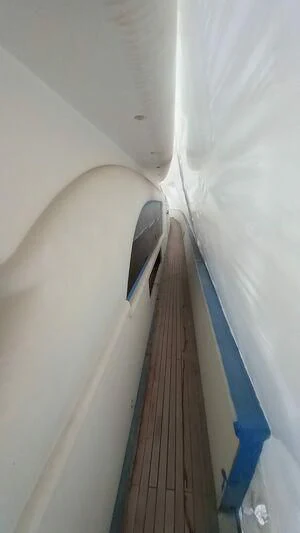 a white wall with a staircase aboard MY LADY ROSE Yacht for Sale