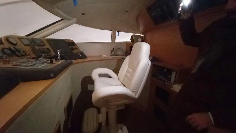 a person sitting at a desk aboard MY LADY ROSE Yacht for Sale