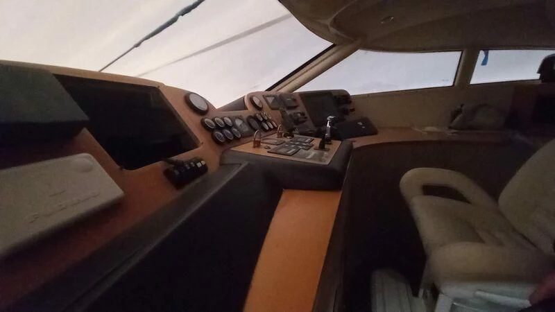 a desk with a computer and other electronics on it aboard MY LADY ROSE Yacht for Sale