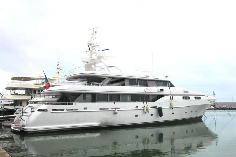 a large white boat aboard THEOLINA Yacht for Sale