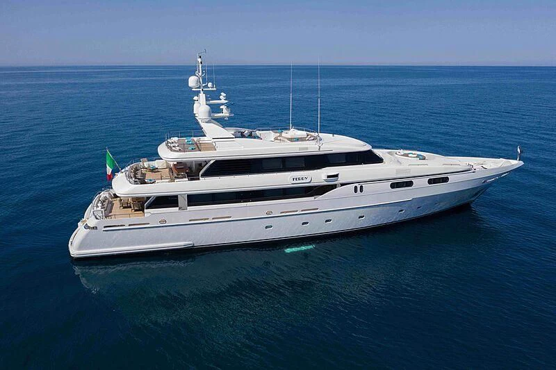 a white yacht in the water aboard THEOLINA Yacht for Sale