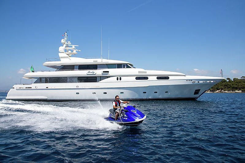 a person on a jet ski aboard THEOLINA Yacht for Sale