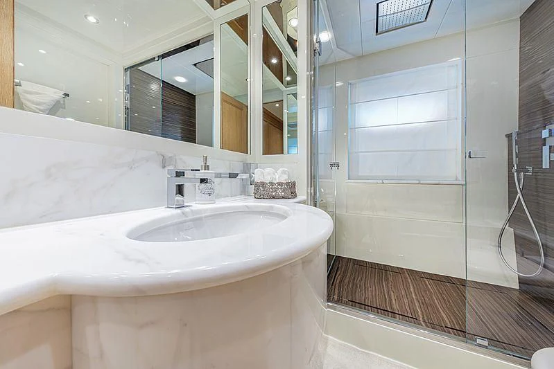 a bathroom with a sink and a shower aboard THEOLINA Yacht for Sale