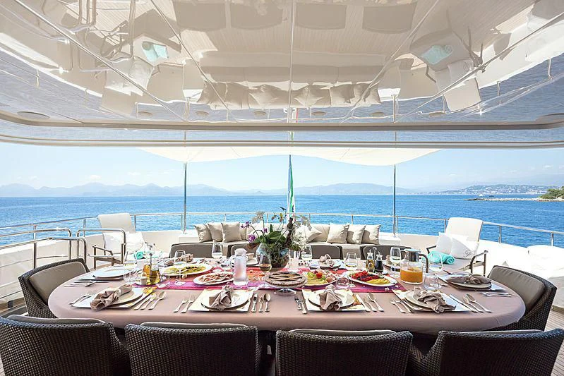a table set for a meal aboard THEOLINA Yacht for Sale