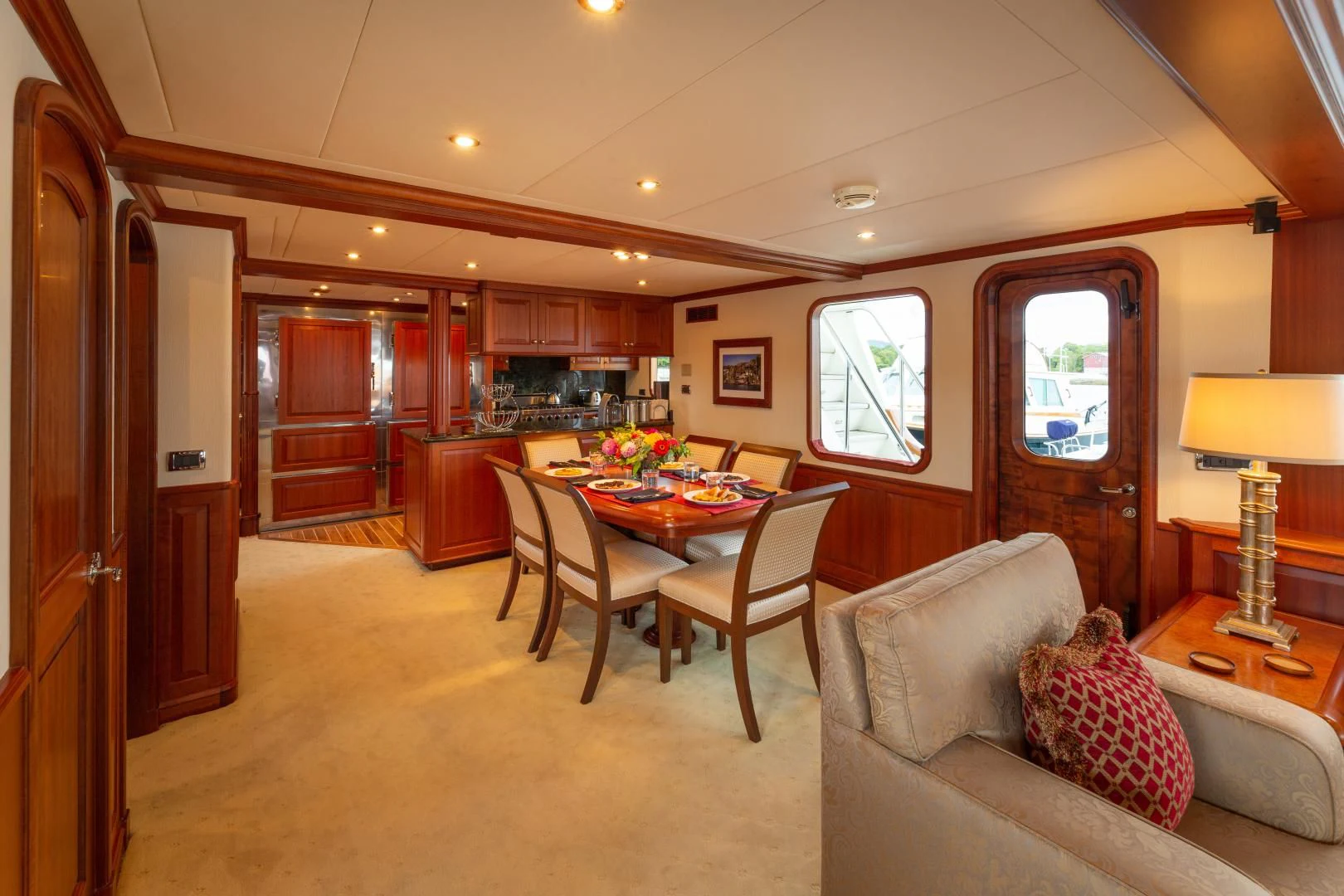 a living room with a couch and a table aboard ISLANDER Yacht for Sale