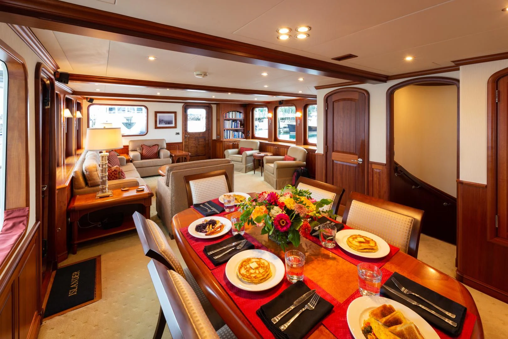 a dining room with a table and chairs aboard ISLANDER Yacht for Sale