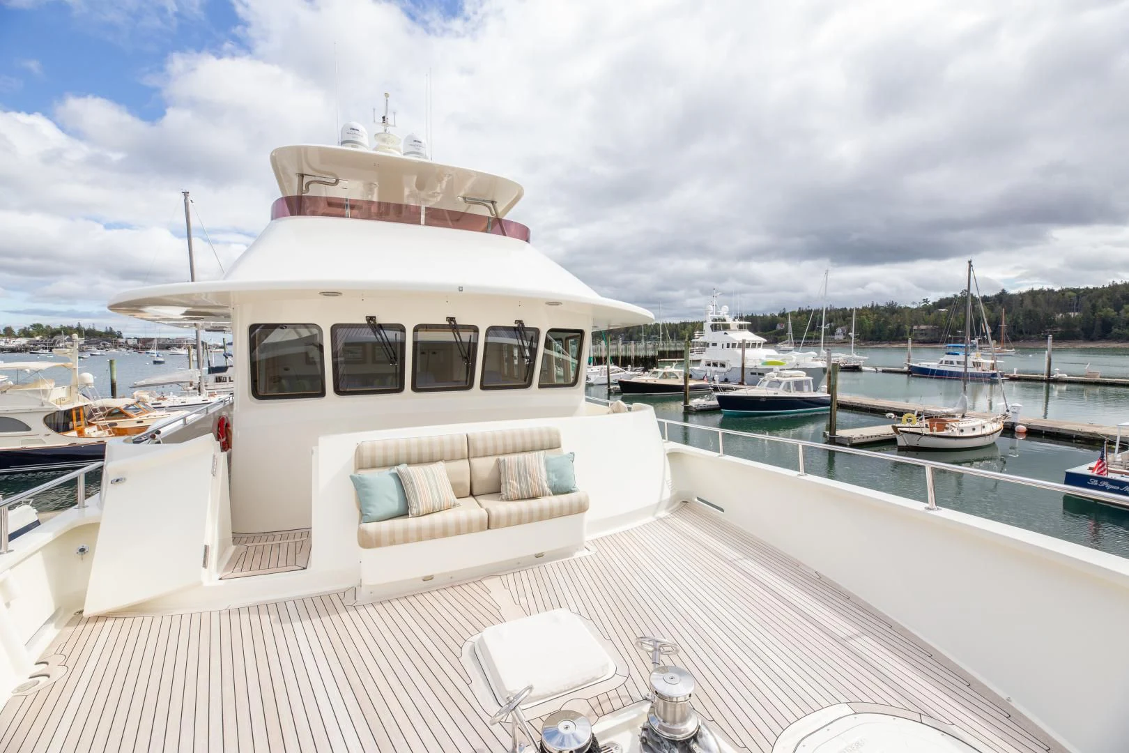 a boat docked at a pier aboard ISLANDER Yacht for Sale