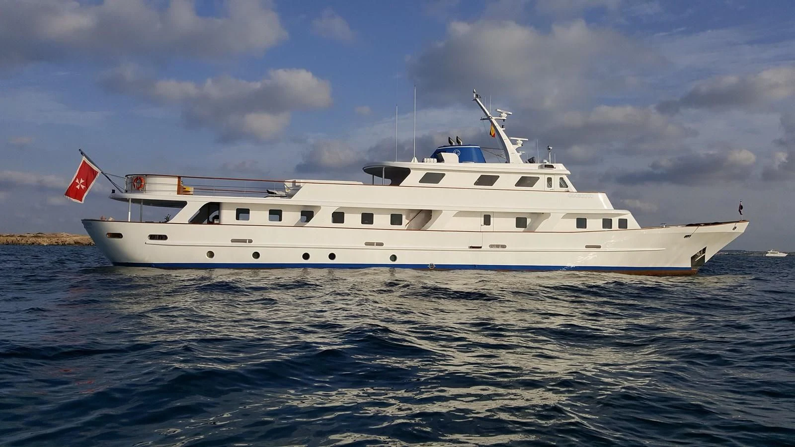 a white yacht in the water aboard TRAFALGAR Yacht for Sale