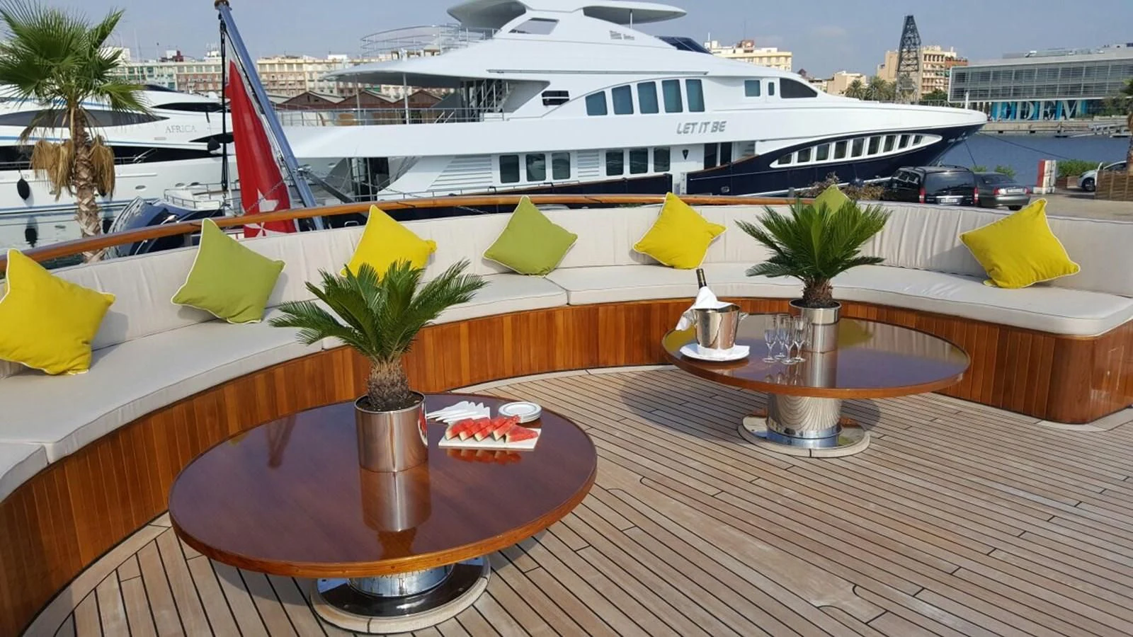 a table with umbrellas on it aboard TRAFALGAR Yacht for Sale
