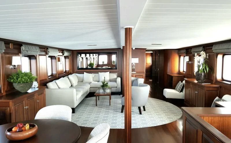 a living room with a large window aboard TRAFALGAR Yacht for Sale