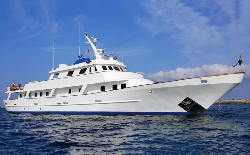 a white boat in the water aboard TRAFALGAR Yacht for Sale