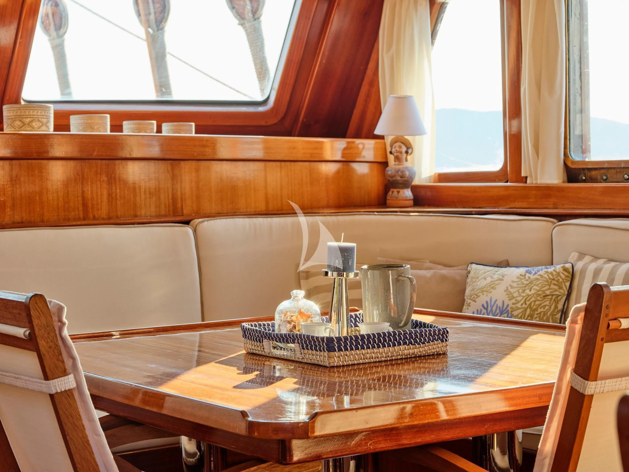 a table with a basket on it aboard MYRA Yacht for Sale